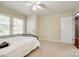 Bedroom featuring neutral carpet, natural light, ceiling fan, and closet at 1154 Doby Ct, Fort Mill, SC 29715