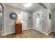 Inviting foyer with hardwood floors, painted walls and a decorative glass door at 1154 Doby Ct, Fort Mill, SC 29715