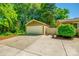 Detached garage with a concrete driveway for parking and storage at 1154 Doby Ct, Fort Mill, SC 29715
