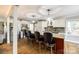 Kitchen featuring granite countertops, stainless appliances, and a breakfast bar with seating at 1154 Doby Ct, Fort Mill, SC 29715