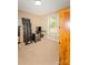 Bedroom with a natural light, wood furniture, a beige carpet, and a window at 125 Southwood Park, Mooresville, NC 28117