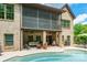 Stunning backyard oasis with pool, covered patio, and ample seating for entertaining friends and Gathering at 1260 Rittenhouse Ln, Rock Hill, SC 29732