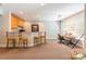 Entertainment room features a bar area with a countertop, seating, lighting, and natural light at 1260 Rittenhouse Ln, Rock Hill, SC 29732