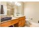 Bathroom featuring vanity with granite countertop, glass bowl sink and modern lighting at 1260 Rittenhouse Ln, Rock Hill, SC 29732