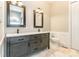 Modern bathroom featuring double vanity, marble countertop, and stylish fixtures for a luxurious feel at 1260 Rittenhouse Ln, Rock Hill, SC 29732