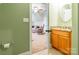 Bathroom showing a view of the spacious bonus room and features a mirror over a sink with vanity cabinet at 1260 Rittenhouse Ln, Rock Hill, SC 29732