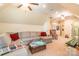 Large bonus room offers a cozy seating arrangement with natural light and views of an adjacent room at 1260 Rittenhouse Ln, Rock Hill, SC 29732