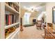 Spacious bonus room featuring a pitched ceiling, fan, a window and plush carpet at 1260 Rittenhouse Ln, Rock Hill, SC 29732