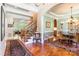 Elegant foyer featuring hardwood floors, a staircase, and an archway leading to a dining room at 1260 Rittenhouse Ln, Rock Hill, SC 29732