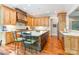 Gourmet kitchen features custom wood cabinetry, a large island, and stainless steel appliances at 1260 Rittenhouse Ln, Rock Hill, SC 29732