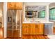 Open concept kitchen and living area view with stainless steel appliances and cabinetry at 1260 Rittenhouse Ln, Rock Hill, SC 29732