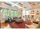 Spacious living area with coffered ceilings, large windows, and seamless flow to the open kitchen area at 1260 Rittenhouse Ln, Rock Hill, SC 29732
