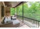 Relaxing screened-in porch with comfortable seating, perfect for enjoying the outdoors without the bugs at 1260 Rittenhouse Ln, Rock Hill, SC 29732