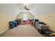 Large attic or storage room with ample space and a ceiling fan at 129 Daniel Efird Dr, Mount Holly, NC 28120