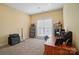 Bedroom featuring bright natural light, comfortable work space, and a relaxed vibe at 129 Daniel Efird Dr, Mount Holly, NC 28120
