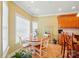 Cozy breakfast nook bathed in natural light with room for a Gathering breakfast table at 129 Daniel Efird Dr, Mount Holly, NC 28120
