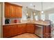 Kitchen showcasing granite countertops, tile backsplash, and stainless steel appliances at 129 Daniel Efird Dr, Mount Holly, NC 28120