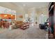 Open concept living area with bar seating, connecting to the kitchen and dining at 129 Daniel Efird Dr, Mount Holly, NC 28120