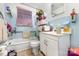The bathroom contains a tub and shower combo and plenty of storage space at 1308 Edgewood Rd, Charlotte, NC 28208