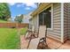 A cozy patio area with comfortable seating and a well-maintained garden providing a perfect outdoor retreat at 13430 Norseman Ln, Huntersville, NC 28078
