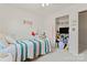 This carpeted bedroom has decor, lighting, and closet space at 13430 Norseman Ln, Huntersville, NC 28078