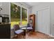 Breakfast nook with large windows overlooking backyard, filled with natural light at 13430 Norseman Ln, Huntersville, NC 28078