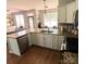 Well-appointed kitchen featuring granite countertops, modern appliances, and ample storage space for culinary enthusiasts at 13430 Norseman Ln, Huntersville, NC 28078