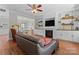 Cozy living room with a fireplace, built-in shelving, and comfortable seating at 13430 Norseman Ln, Huntersville, NC 28078