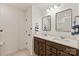 Elegant bathroom with double sinks, modern fixtures, and ample lighting for a spa-like experience at 1381 Regions Blvd, Fort Mill, SC 29707