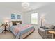 Cozy bedroom featuring a comfortable bed, a soft chair, and soothing decor for restful nights at 1381 Regions Blvd, Fort Mill, SC 29707