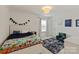 Charming bedroom with a whimsical decor and playful accents, perfect for a imagination at 1381 Regions Blvd, Fort Mill, SC 29707
