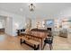 Bright and open living room with a fireplace, custom built-ins, and hardwood floors at 1381 Regions Blvd, Fort Mill, SC 29707