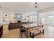 Spacious living room with fireplace, built-in shelving, and large windows for natural light at 1381 Regions Blvd, Fort Mill, SC 29707
