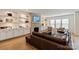 Inviting living room featuring custom built-ins, a fireplace, and ample seating space at 1381 Regions Blvd, Fort Mill, SC 29707
