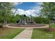 Fun playground area with slides and climbing structures for , surrounded by lush greenery at 1381 Regions Blvd, Fort Mill, SC 29707