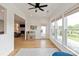 Bright sunroom with large windows, playful decor, and access to the backyard at 1381 Regions Blvd, Fort Mill, SC 29707
