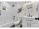 Modern bathroom showcases clean white design, herringbone shower tile, and sleek black fixtures at 139 Elysian Dr, Mooresville, NC 28117