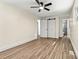Bright bedroom leads to bathroom with glass door shower and double doors to the main space at 139 Elysian Dr, Mooresville, NC 28117
