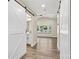 Bright bedroom features dual barn doors to ensuite bathroom and large window at 139 Elysian Dr, Mooresville, NC 28117