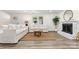 Cozy living room with neutral tones, a decorative fireplace, and hardwood floors at 139 Elysian Dr, Mooresville, NC 28117