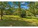A view of the backyard with home. Enjoy outdoor living with this beautiful homesite at 157 E Meadowview Dr, Statesville, NC 28625