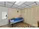 Finished basement room with tanning bed, neutral decor, and closet storage at 157 E Meadowview Dr, Statesville, NC 28625