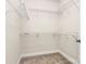 Walk-in closet with multiple levels of wire shelving for maximum storage and organization at 174 Hanks Bluff Dr, Mooresville, NC 28117