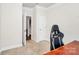 Cozy office space with a desk and large window and an open doorway at 174 Hanks Bluff Dr, Mooresville, NC 28117