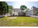 Fenced backyard with a screened-in porch providing private outdoor space at 18629 Coachmans Trce, Cornelius, NC 28031
