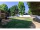 Expansive backyard boasting a large screened-in porch and ample space for outdoor activities and gatherings at 18629 Coachmans Trce, Cornelius, NC 28031