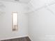 Spacious walk-in closet with ample shelving and a full-length mirror at 18629 Coachmans Trce, Cornelius, NC 28031