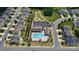 Aerial view of community pool, parking, and playground area at 1957 Tablerock Dr # 59, York, SC 29745