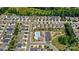 Aerial view of community pool, playground, and parking at 1957 Tablerock Dr # 59, York, SC 29745