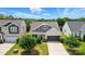 An aerial view of a well-maintained home with a green lawn, mature trees, and a serene neighborhood setting at 1957 Tablerock Dr # 59, York, SC 29745